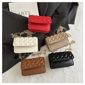 Collection of mini quilted crossbody bags with gold chains in five assorted colors