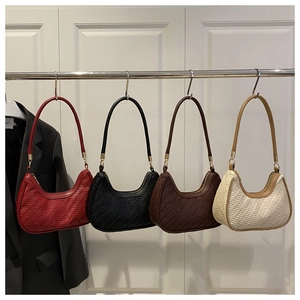 Detail of four woven hobo bags in red, black, coffee and beige with V-stitch texture