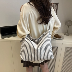 Chic black and white striped canvas tote bag for women with large capacity shoulder strap