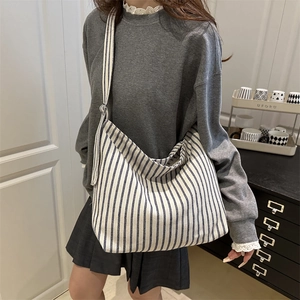 Vertical blue and white striped large canvas tote bag with wide shoulder strap