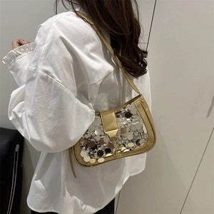 Sac sous le bras tendance à paillettes dorées avec bordure métallique et bandoulière
