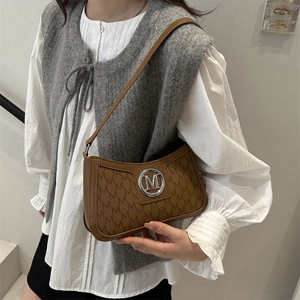 Brown French vintage underarm bag with M-letter print and silver metal logo on front