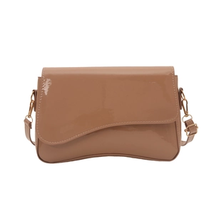 Deep caramel glossy shoulder bag with minimalist curved flap and gold hardware