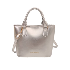 Silver metallic bucket bag in glossy leather with round handle and adjustable strap