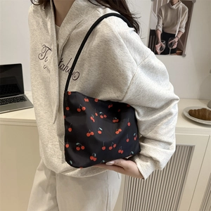 Minimalist black bucket bag with cherry print, stylish casual shoulder crossbody bag