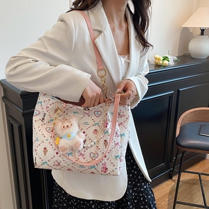 Sweet cartoon printed white tote bag with pink straps and plush bear charm