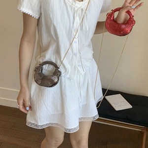 Chic metallic crescent bag with spiral texture and gold chain strap for women