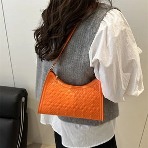 Minimalist bright orange quilted shoulder bag in PU leather with gold zipper for women