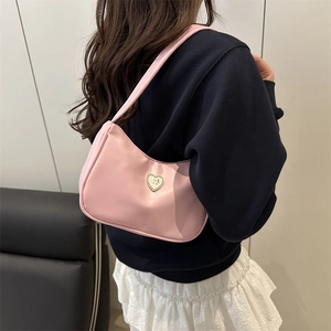 Pink minimalist crescent hobo bag for women with gold heart metal buckle detail