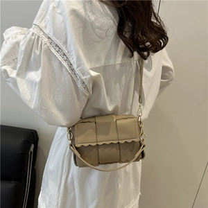 Fashionable khaki woven leather shoulder bag with chain strap for women in 2025 style