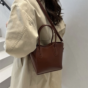 Brown contrast stitch tote bag with Fashion embossing and adjustable shoulder strap