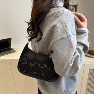 Chic black snakeskin texture hobo shoulder bag with elegant gold hardware for women