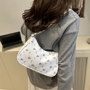 Chic white floral shoulder bag with Beauty print and trendy half-moon design for women