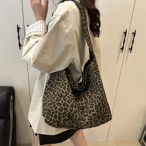 Large leopard print tote bag for women with wide shoulder straps in a stylish casual design