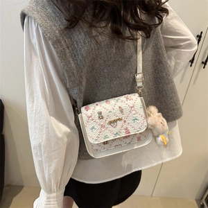 Chic women's small square shoulder bag with floral print and bear charm on PU leather