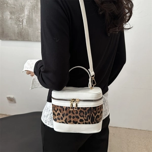 Fashion leopard cylinder crossbody bag with gold zippers and detachable shoulder strap