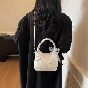 Chic white bucket bag with bow detail and lace ribbon for women's autumn fashion
