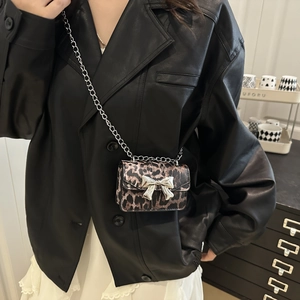 Leopard print crossbody bag for women with silver bow ornament and chain strap
