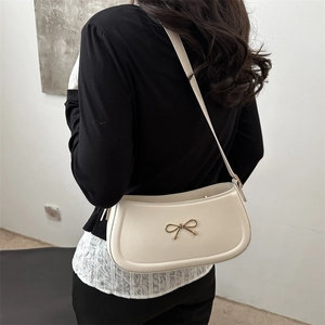 Chic cream bow shoulder bag for women, stylish faux leather underarm handbag style
