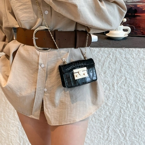 Chic black crocodile embossed mini flap bag with gold chain strap and metal lock