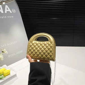 Golden quilted mini handbag with metal finish and silver chain strap for women