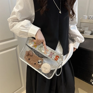 Bolso de mano cuadrado de PVC transparente con bordado SNACKS y ribete plateado