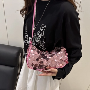 Chic pink sequin crescent moon shoulder bag with glossy texture for autumn fashion