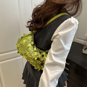 Neon lime green crescent moon bag with metallic sequins and slim shoulder strap