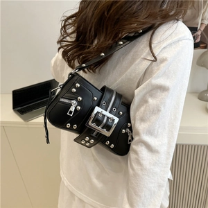 Chic black punk-style shoulder bag with silver rivets and zippers for women