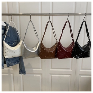 Row of studded hobo bags in white, silver, brown, wine red and black finishes