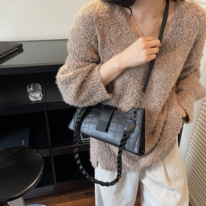 Minimalist black crocodile pattern crossbody bag with woven handle for women
