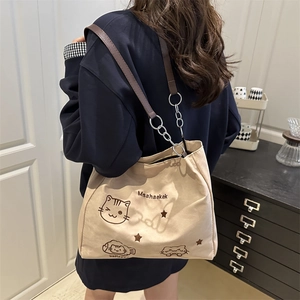 Beige canvas shoulder bag with cute cat prints and brown leather chain strap