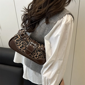Chic leopard print underarm bag with silver buckle and brown leather trim for women