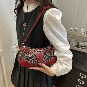 Retro leopard print underarm bag with red leather trim and silver metal buckle