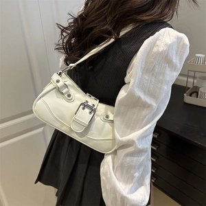 Chic cream underarm bag with large silver buckle and rivet details for women