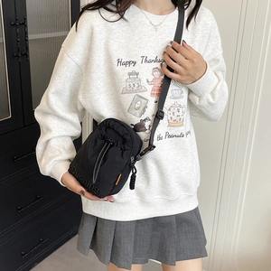 2025 Fashion black nylon bucket crossbody bag with drawstring for stylish women