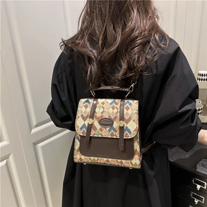 Chic geometric pattern backpack for women with brown leather details and a stylish logo