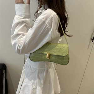 Minimalist avocado green crocodile embossed baguette bag with golden metal buckle