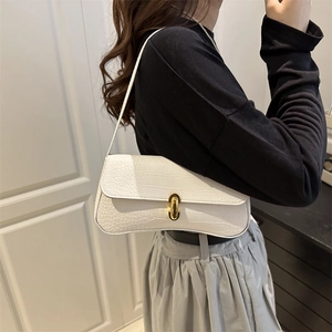 Minimalist white crocodile embossed leather baguette bag with elegant gold buckle
