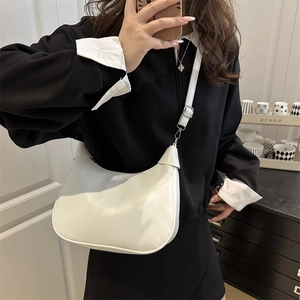 Minimalist white half-moon crossbody bag for women with adjustable strap in casual style