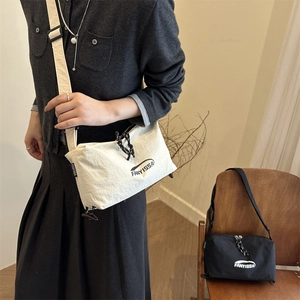 Chic 2025 autumn minimalist shoulder bag with adjustable strap in black and cream