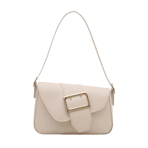 Minimalist beige leather shoulder bag with a prominent polished gold square buckle