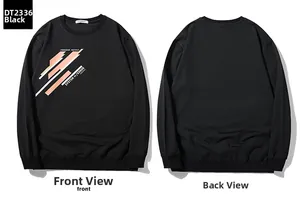 Front and back view of black crewneck sweatshirt with orange geometric print and ribbed cuffs