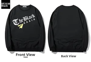 Flat lay of black crewneck sweatshirt with gothic text and paper plane graphic design