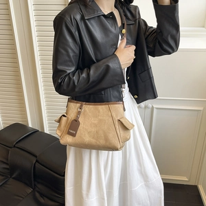 Retro khaki crossbody shoulder bag with side pockets and fashion tag for women