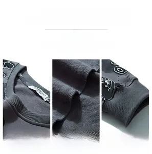 Detailed macro view of dark grey cotton sweatshirt collar, cuffs and precise stitching