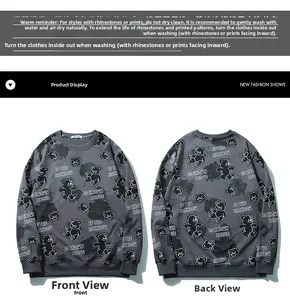 Front and back view of grey sweatshirt with black bear patterns and artistic text print