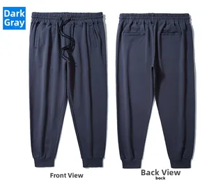 Front and back detail of dark grey joggers with elastic drawstring waist and ribbed cuffs