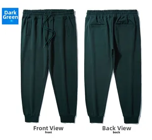 Front and back view of dark green knit joggers featuring drawstring waist and ribbed cuffs