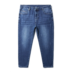 Mens loose straight dark blue jeans with embroidered coin pocket and washed denim texture